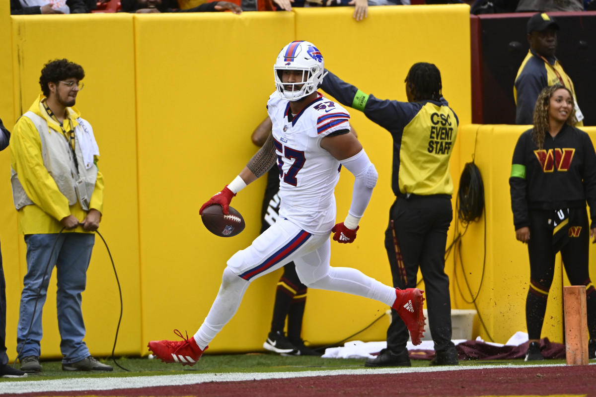 Buffalo Bills defensive end A.J. Epenesa scores a touchdown against the Washington Commanders.